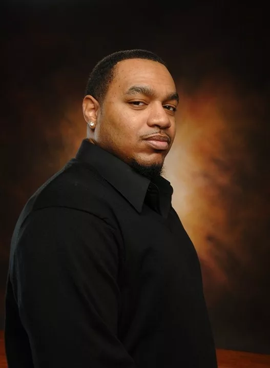 Profile of man in black jacket