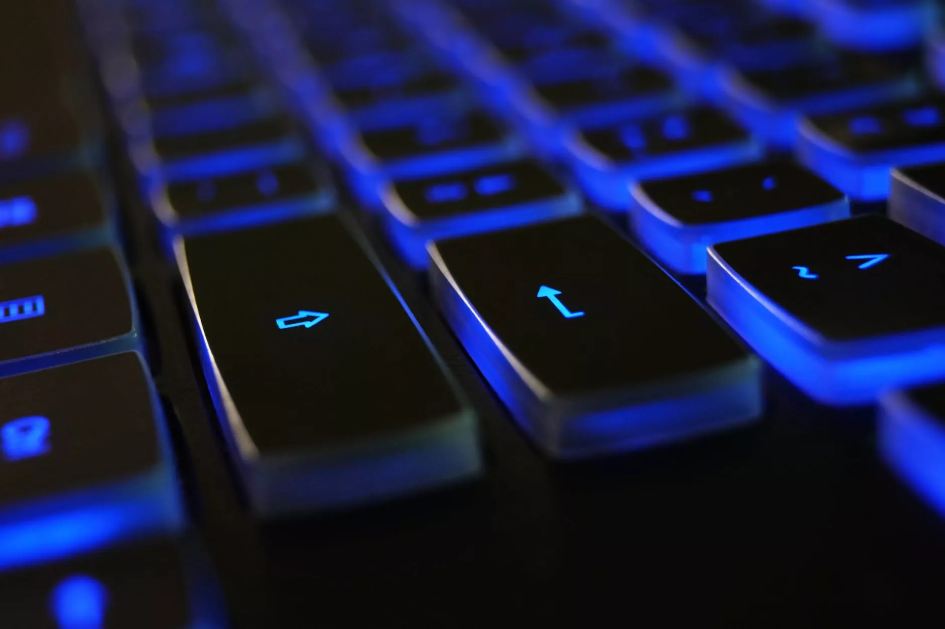 closeup photo of black and blue keyboard
