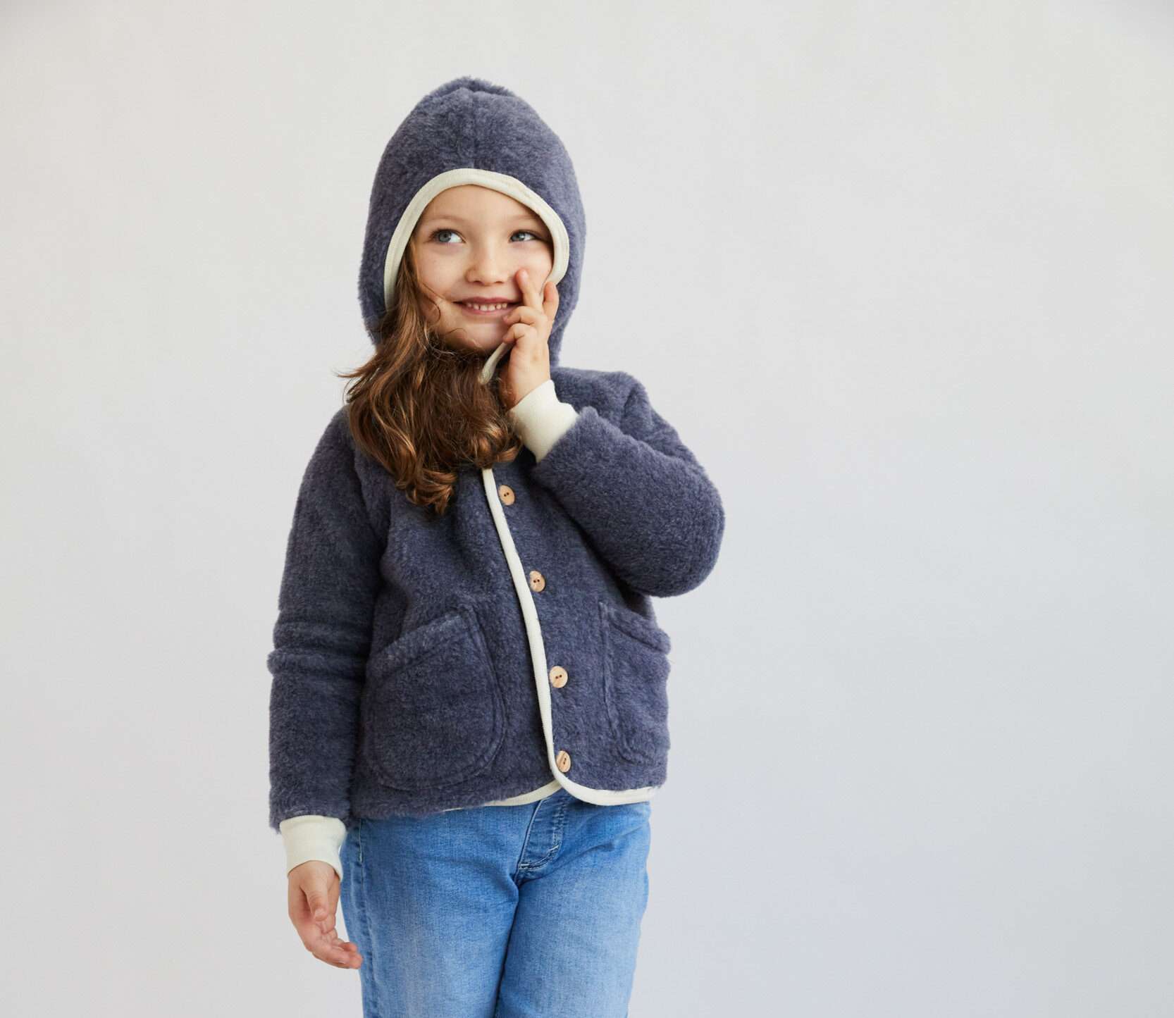 Child in blue wool coat
