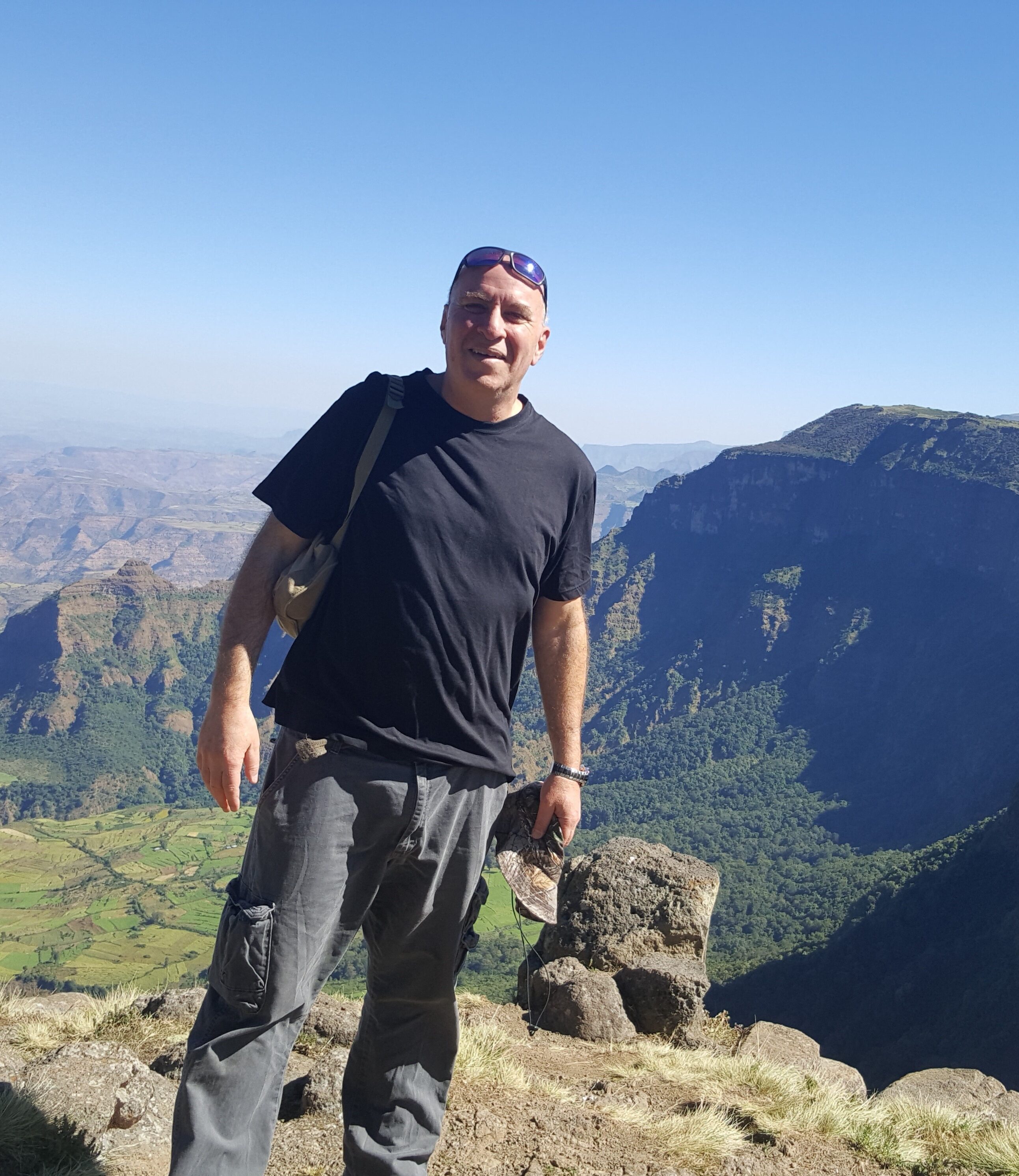 Man standing on mountain.